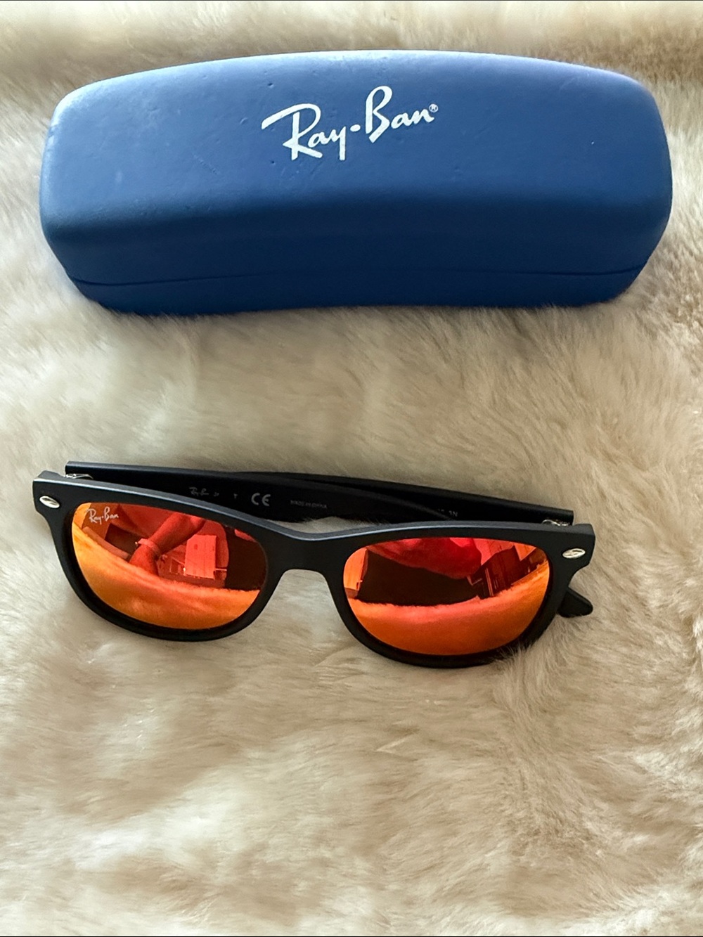 Kids Ray-Ban Black Frame Sunglasses with Red-Orange Mirrored Lenses